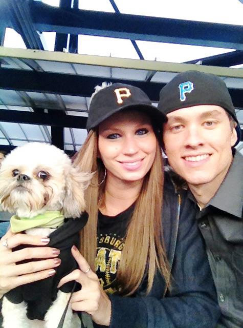 Matt and Vanessa attend Pup Night at PNC Park for a Pirates game with their dog, Wesley.