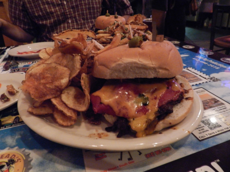 The Jack-O: Strips of sirloin steak topped with onion rings, roasted red peppers, sharp cheddar and Killer Ranch.